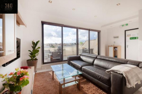 Penthouse and BBQ Kitchen Island & Massive living by 360 Estates